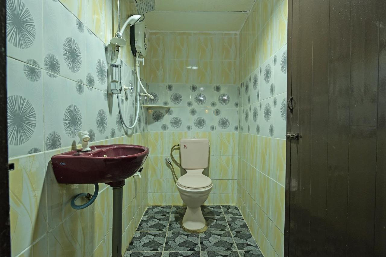 Super Oyo Capital O 90659 Raintown Timbers Hotel تايبينغ المظهر الخارجي الصورة